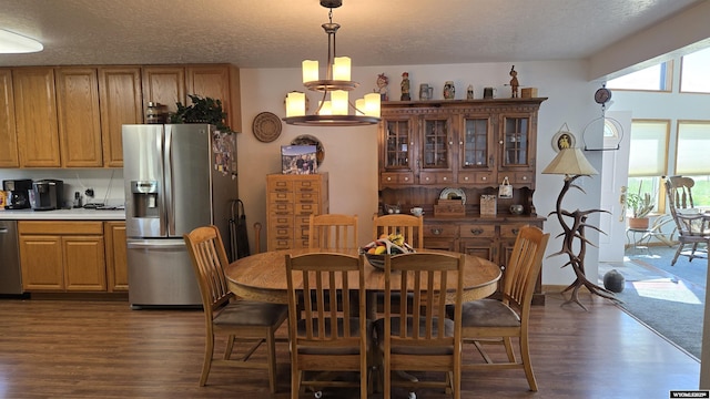 190 Ln 7, Thermopolis, WY 82443 - dining space with dark wood finished floors and a textured ceiling
