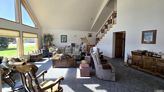 190 Ln 7, Thermopolis, WY 82443 - living room with high vaulted ceiling, carpet, stairway, and baseboards