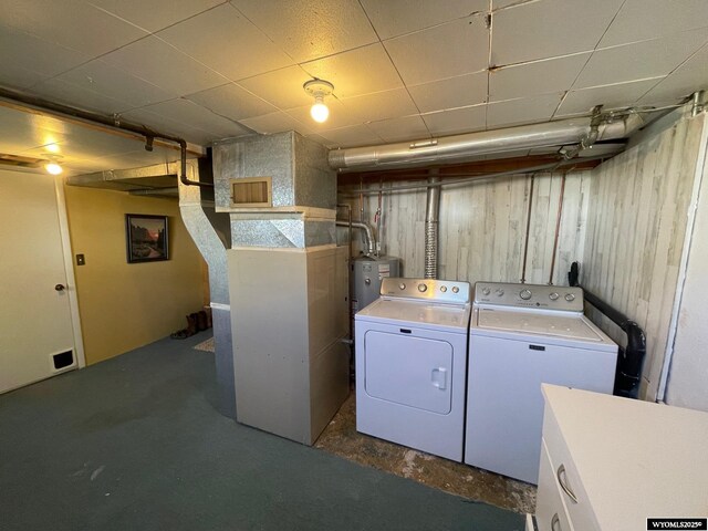 309 Cedar Ave, Kemmerer, WY 83101 - washroom with washer and dryer and heating unit