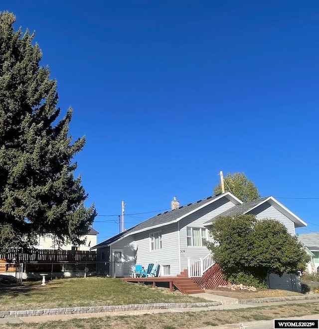 309 Cedar Ave, Kemmerer, WY 83101 - view of side of property featuring a chimney