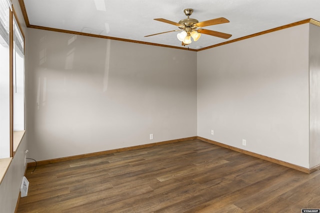 1673 Troy, Kemmerer, WY 83101 - spare room with ceiling fan, ornamental molding, dark wood-type flooring, and baseboards