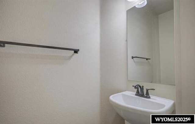 827 Dusty Ter, Mills, WY 82604 - bathroom with a sink