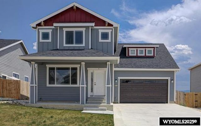 827 Dusty Ter, Mills, WY 82604 - craftsman-style home with board and batten siding, driveway, and a garage