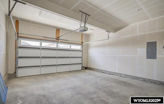 827 Dusty Ter, Mills, WY 82604 - garage featuring electric panel and a garage door opener