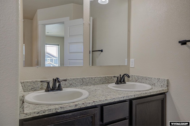 827 Dusty Ter, Mills, WY 82604 - full bath with double vanity and a textured wall