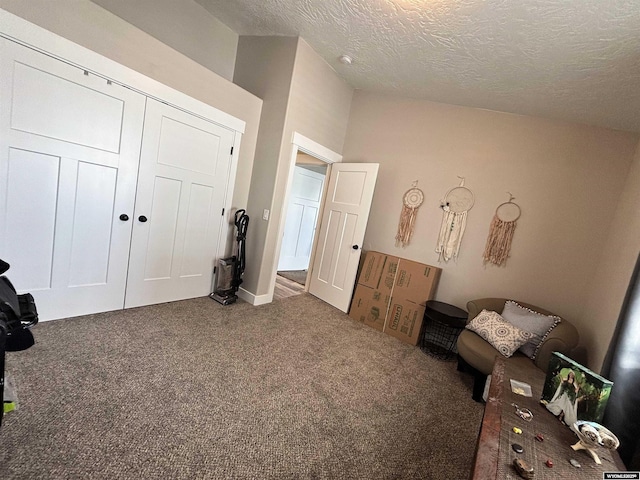 3440 Summit, Rock Springs, WY 82901 - carpeted bedroom featuring a textured ceiling and a closet