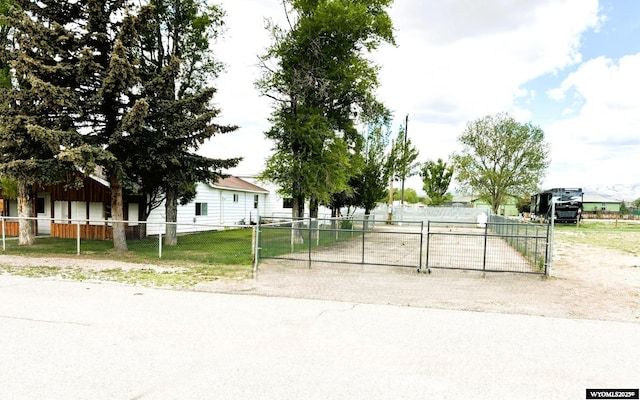 314 S Labarge St, La Barge, WY 83123 - view of property hidden behind natural elements with a gate