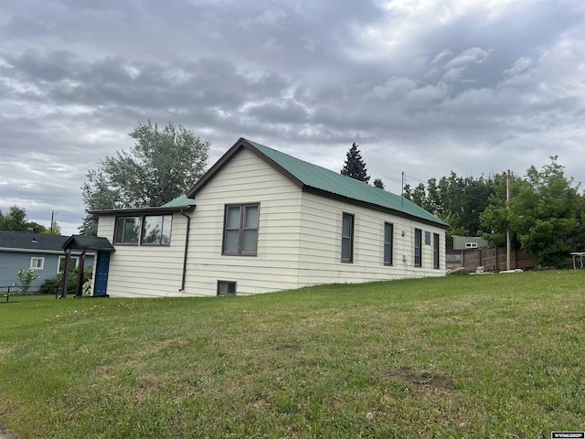 195 W Gatchell, Buffalo, WY 82834 - view of side of home with metal roof
