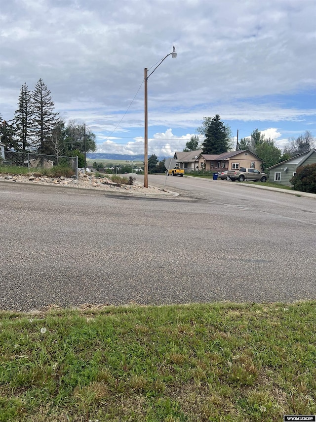 195 W Gatchell, Buffalo, WY 82834 - view of asphalt road featuring street lighting