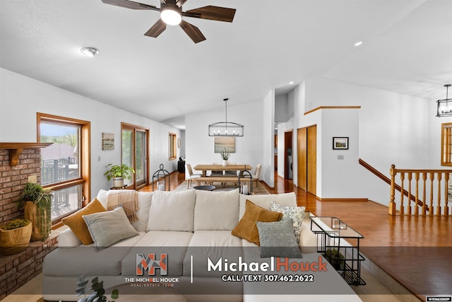 2001 Newport, Casper, WY 82609 - living area featuring a chandelier, lofted ceiling, wood finished floors, a ceiling fan, and recessed lighting