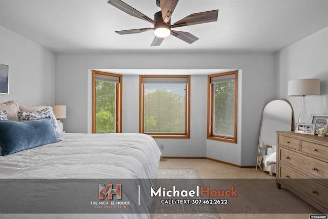 2001 Newport, Casper, WY 82609 - carpeted bedroom with baseboards and ceiling fan