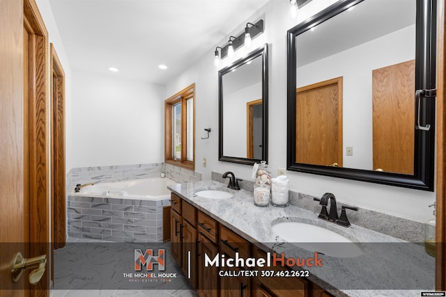 2001 Newport, Casper, WY 82609 - bathroom featuring a garden tub, double vanity, tile patterned flooring, and recessed lighting