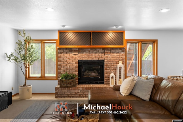 2001 Newport, Casper, WY 82609 - living area with carpet flooring, baseboards, a fireplace, and recessed lighting