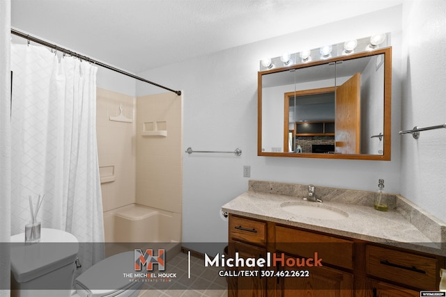 2001 Newport, Casper, WY 82609 - bathroom featuring vanity, toilet, shower / tub combo, and tile patterned floors