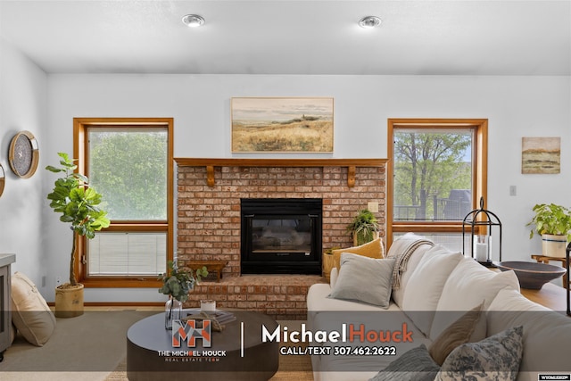 2001 Newport, Casper, WY 82609 - living area featuring a fireplace and plenty of natural light