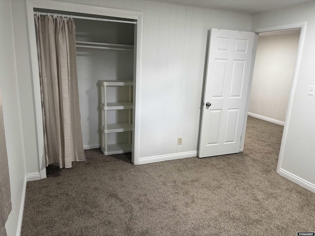 808 E Adams Ave, Riverton, WY 82501 - unfurnished bedroom with carpet floors, baseboards, and a closet