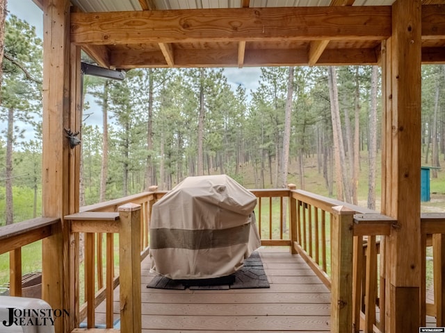 2921 Esterbrook Rd, Esterbrook, WY 82633 - wooden deck featuring area for grilling and a view of trees