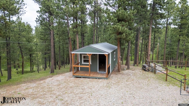 2921 Esterbrook Rd, Esterbrook, WY 82633 - view of outbuilding featuring a wooded view