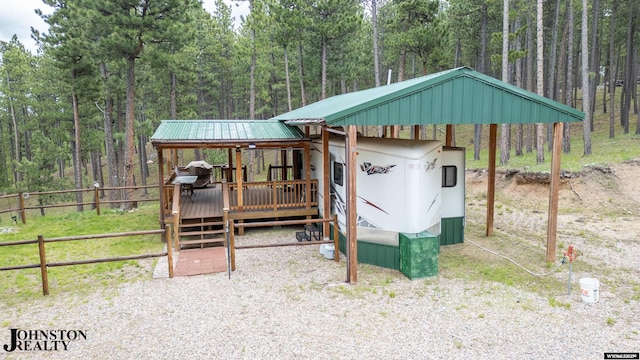 2921 Esterbrook Rd, Esterbrook, WY 82633 - view of outbuilding featuring a forest view