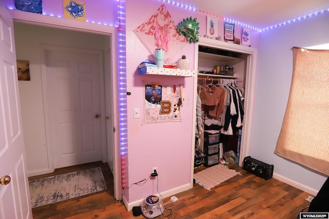 108 Tamari Dr, Buffalo, WY 82834 - bedroom featuring wood finished floors, a closet, and baseboards