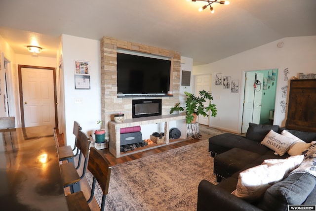 108 Tamari Dr, Buffalo, WY 82834 - living area with vaulted ceiling, wood finished floors, and baseboards