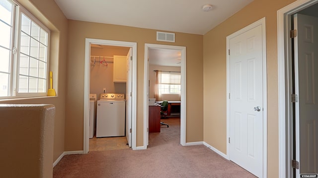 1141 Meadow Ln, Douglas, WY 82633 - hallway featuring washing machine and dryer, light colored carpet, baseboards, and an office area