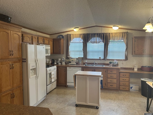 608 Navy Row, Midwest, WY 82643 - kitchen with white appliances, a textured ceiling, a sink, brown cabinets, and ornamental molding