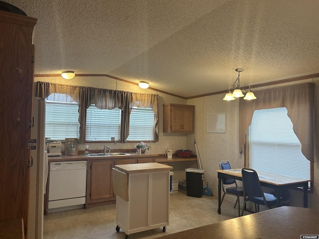 608 Navy Row, Midwest, WY 82643 - kitchen featuring dishwasher, a chandelier, a textured ceiling, a sink, and lofted ceiling