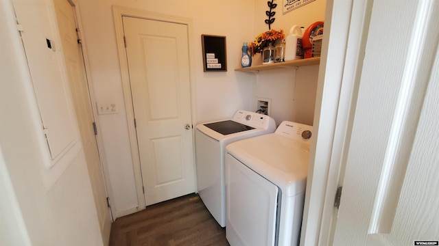 307 3rd St, Chugwater, WY 82210 - laundry area with washing machine and dryer and dark wood-style flooring