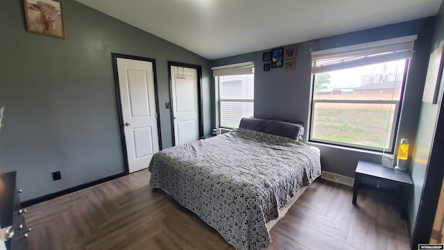 307 3rd St, Chugwater, WY 82210 - bedroom featuring vaulted ceiling and baseboards