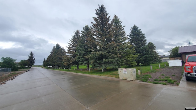 307 3rd St, Chugwater, WY 82210 - view of concrete road featuring curbs