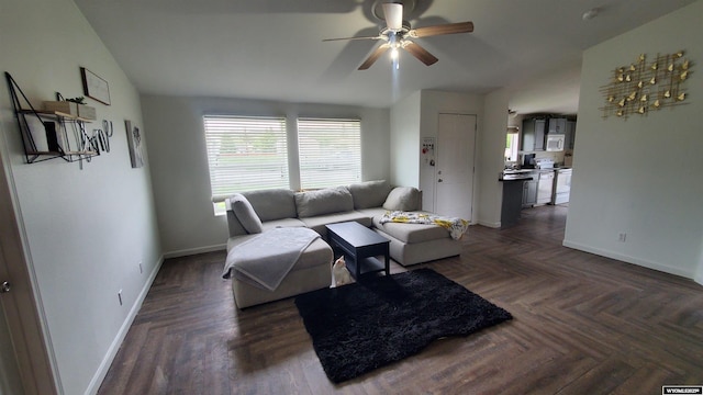 307 3rd St, Chugwater, WY 82210 - living area featuring baseboards, a ceiling fan, and lofted ceiling