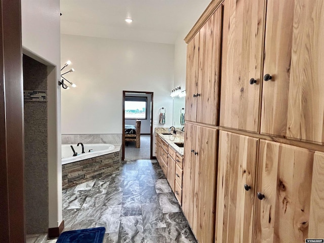 207 Eagle Dr, Greybull, WY 82426 - full bathroom with double vanity, a garden tub, and marble finish floors