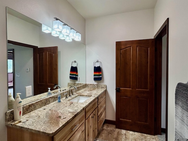 207 Eagle Dr, Greybull, WY 82426 - bathroom featuring vanity and baseboards