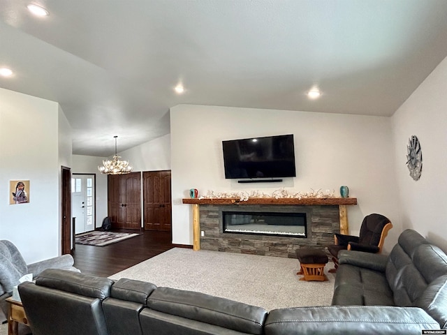 207 Eagle Dr, Greybull, WY 82426 - living room featuring a chandelier, vaulted ceiling, recessed lighting, a fireplace, and baseboards