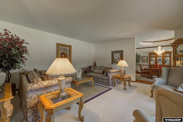 2867 Ardon Ln, Casper, WY 82609 - carpeted living room featuring a chandelier