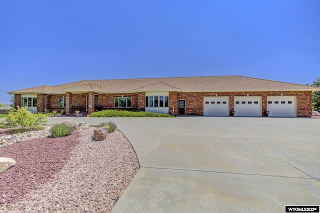 2867 Ardon Ln, Casper, WY 82609 - ranch-style house with driveway and an attached garage