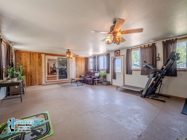 7549 Taxiway, Casper, WY 82604 - workout area featuring a ceiling fan and wooden walls