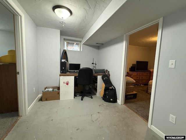 210 N 5th St W, Riverton, WY 82501 - office area with concrete floors and baseboards