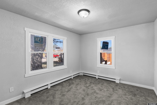 3057 Allendale Blvd, Casper, WY 82601 - spare room with carpet floors, a textured ceiling, and baseboard heating