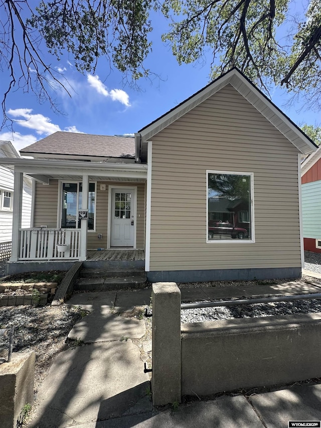 409 B St, Rock Springs, WY 82901 - view of front of house featuring a porch