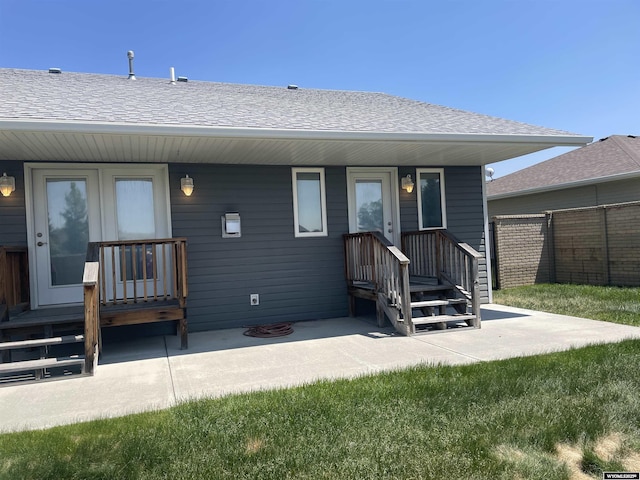 4924 Mountain Way, Casper, WY 82601 - rear view of house featuring a patio area and roof with shingles