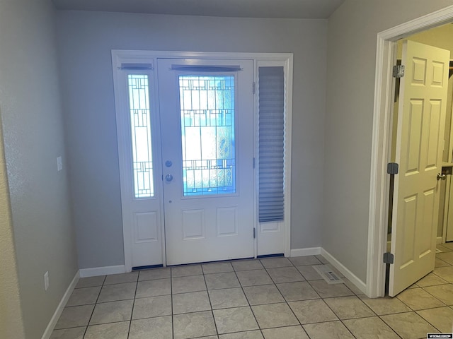4924 Mountain Way, Casper, WY 82601 - foyer entrance featuring light tile patterned flooring and baseboards
