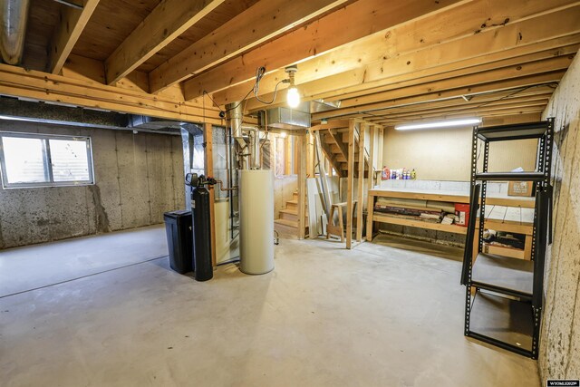 1301 Overland Dr, Rock Springs, WY 82901 - basement with water heater and stairs