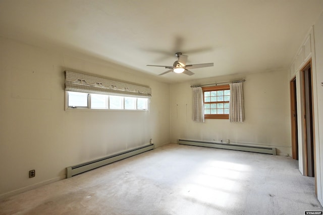 1339 S Mitchell St, Casper, WY 82601 - carpeted spare room featuring a baseboard radiator and ceiling fan