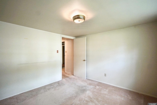 1339 S Mitchell St, Casper, WY 82601 - empty room with light carpet and baseboards
