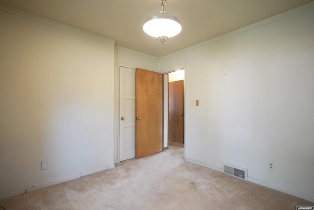 1339 S Mitchell St, Casper, WY 82601 - unfurnished room featuring ornamental molding and light carpet