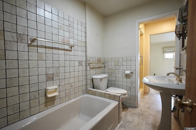 1339 S Mitchell St, Casper, WY 82601 - full bath with a tub to relax in, tile walls, and a shower