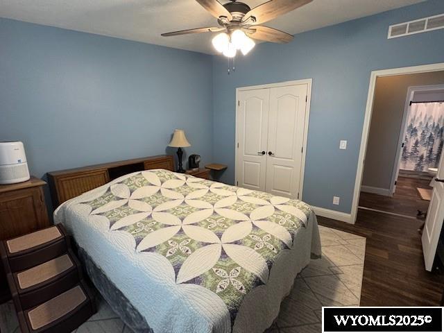 309 Susie Ave, Diamondville, WY 83116 - bedroom featuring a closet, wood finished floors, and ceiling fan