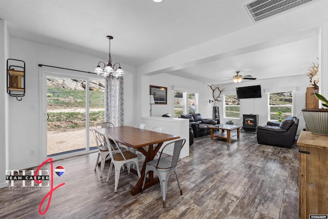 67 Monument Creek Rd, Hanna, WY 82327 - dining area featuring dark wood-style floors, a chandelier, and ceiling fan